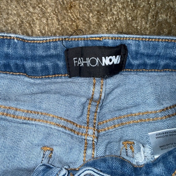 Fashion Nova Light Blue Ripped Jean Shorts - Picture 3 of 4